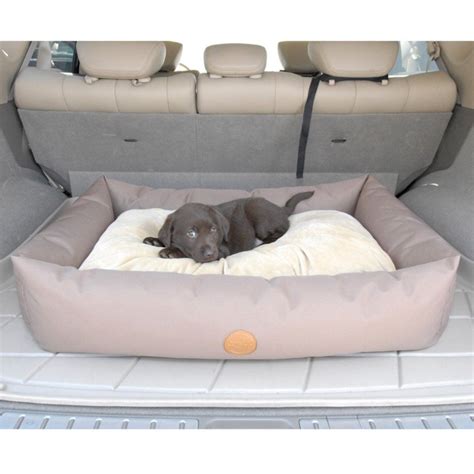 This travel bed will keep your best friend comfortable and ...