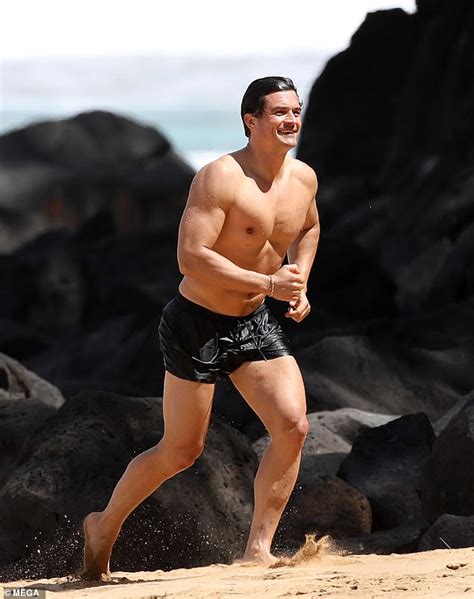 Check spelling or type a new query. Orlando Bloom showcases his VERY buff physique as he ...