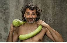 zucchini big squash stock shirtless smiling man shutterstock