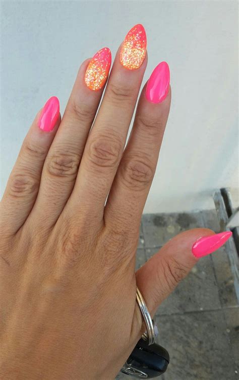 When choosing a color scheme for almond shape, you flowers on nails are popular at any time of the year, but in spring and summer, it is practically out of. Almond nails, pink and orange sparkle | Almond nails, My ...