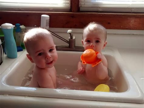 Best twin pack 'n play: How We Do Bath Time With Twins (without a bath tub!)