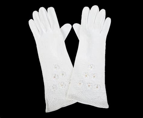 Find & download free graphic resources for football glove. A pair of white cotton ladies evening gloves featuring an ...