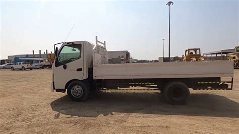 Abu dhabi, uae p.o box : 2012 Hino 711 300 4x2 Flatbed Truck- Dubai, UAE Auction ...