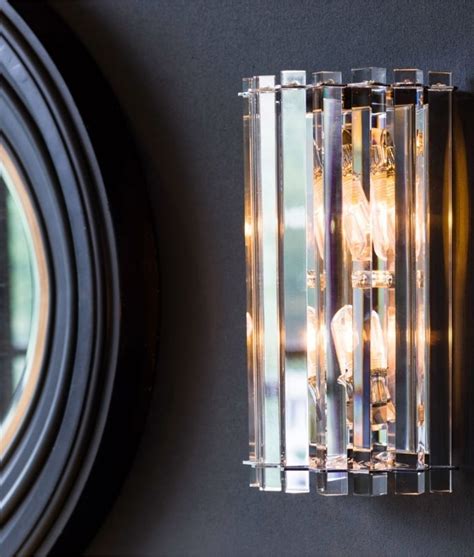 A stylish acrylic shade with a chrome metal frame. Crystal Prism and Chrome Wall Light