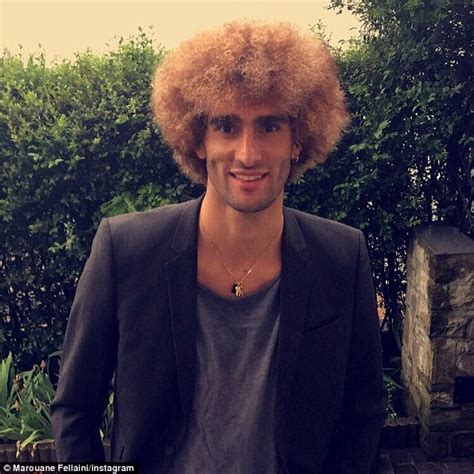 Napoli, at stadio san paolo on april 17, 2019 in naples, italy. Marouane Fellaini follows Aaron Ramsey and goes for a ...