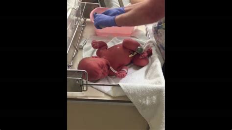 Taking baby away in the first hour for a bath inhibits that, he says. First bath - YouTube