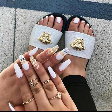 White & Gold #whitenails | Coffin nails designs, Bling ... Flowers or studs on your accent nails will attract attention to your manicure.