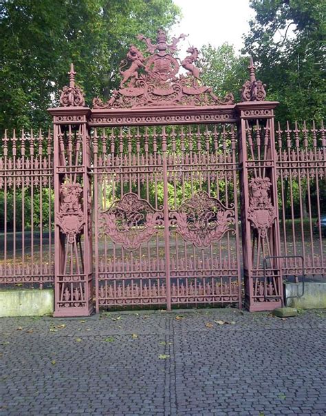 With a forged metal fence, iron sheet green color, with street lights. Paint Colors for Iron Gates and Fences (With images ...