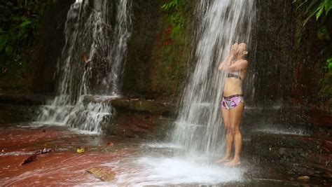 Enjoy our hd porno videos on any device of your choosing! Sexy Girl With Bikini Taking A Shower In Waterfall Stock ...