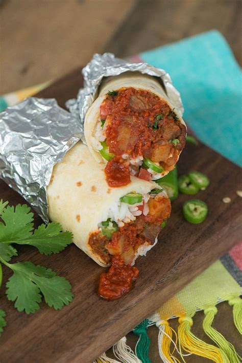 In spanish, the word colorado means colored red, which might be a reason why it's known by this name. Chile Colorado Burrito with Potatoes - Nibbles and Feasts ...