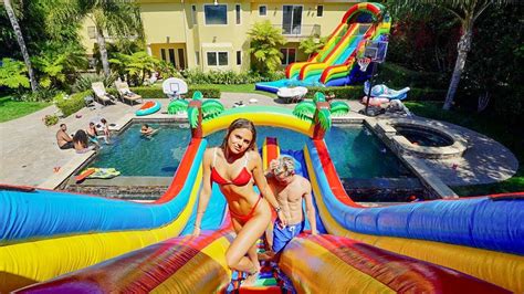 The best backyard inflatable water slide has three things. WORLD'S LARGEST BACKYARD WATERPARK!! - YouTube