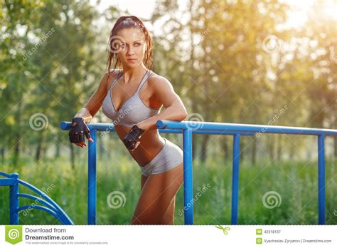 1 736 просмотровчетыре дня назад. Fitness Woman Relax After Workout Exercises On Bars ...