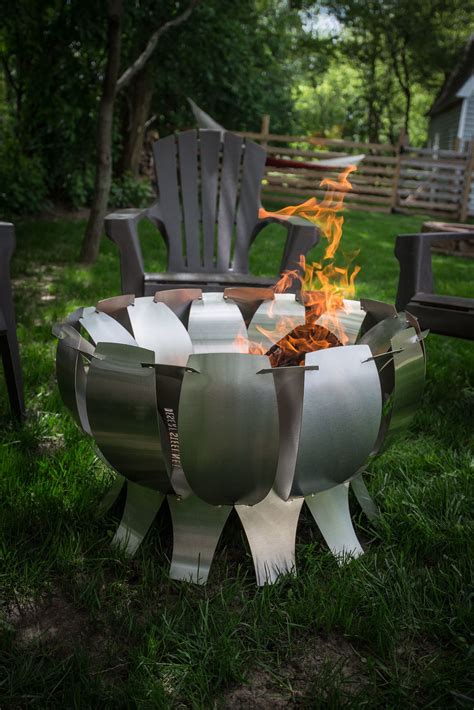 This ingenious fire pit bowl can be added to any table with a standard umbrella hole, including wicker, wood, glass and wrought iron. Tanami Stainless Steel Fire Pit | Wood burning fire pit ...