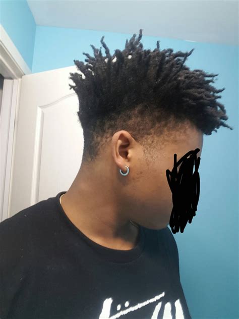 Afro fade haircut looks fabulous on black men with a bushy beard. High top fade dreadlock style. 20 Unique Dreadlock ...