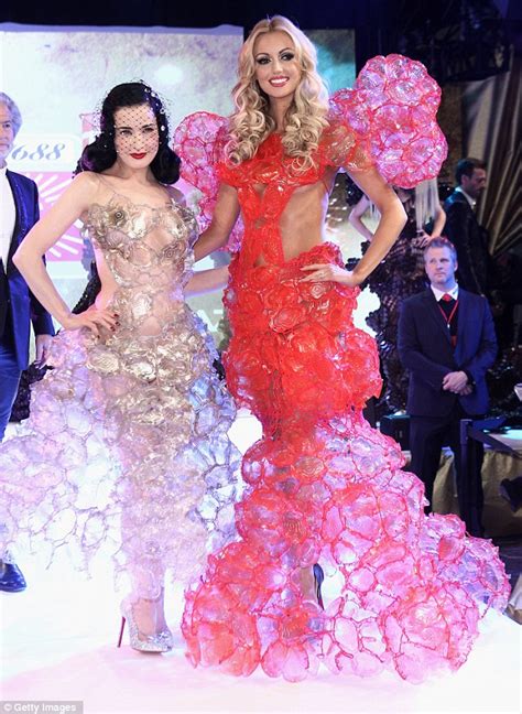 Choose the clothes the stars should be wearing. Dita Von Teese dresses in clear plastic gown made entirely ...