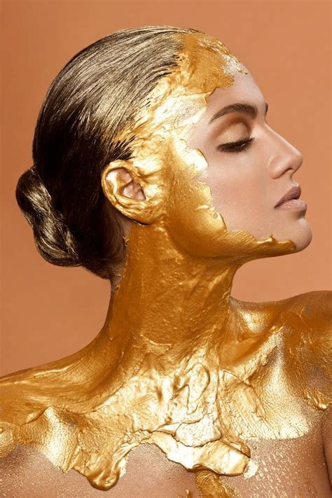 Magnificent lady in a perfect make up is shows jewelry set. Body paint in gold | Photography concepts | Pinterest ...