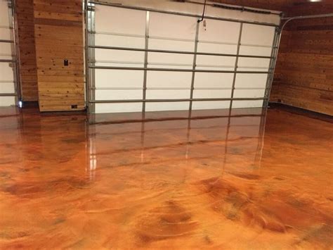 An epoxy covering will protect your garage flooring from any and every situation. Metallic Epoxy | Flooring, Hardwood floors, Hardwood