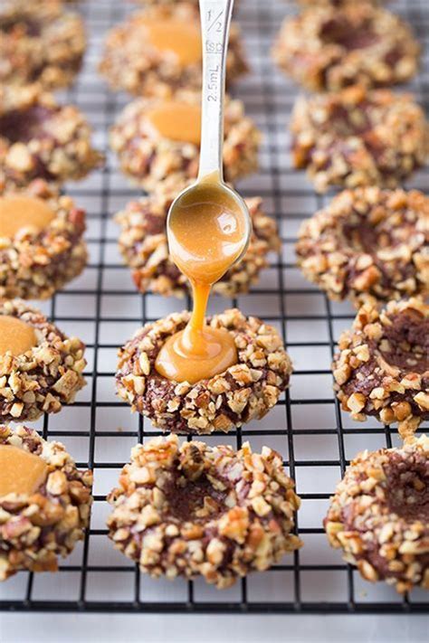 For me, they are the best cookie around for christmas. Salted Caramel Turtle Thumbprint Cookies | Best christmas ...