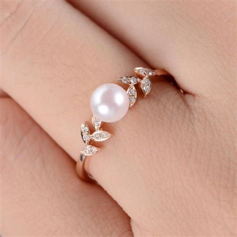 My question is, i have been researching nice wedding bands and many of you recommended qalo bands. Pearl Rose Gold Engagement Ring Flower Unique Wedding ...