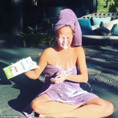 Amateur hottie leaves nothing to the imagination. Chrissy Teigen wears just a towel while showering herself ...