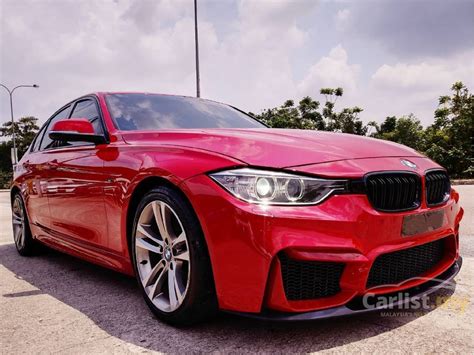 The maroon car here is a 2008 328i—six cylinders, 230 hp. BMW 328i 2013 Sport Line 2.0 in Johor Automatic Sedan Red ...