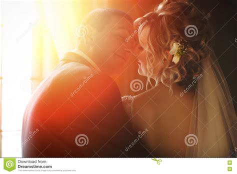 Free wedding stock photos and illustrations. A View From Behind On A Wedding Couple Kissing In The Lights Of Stock Photo - Image of fashion ...