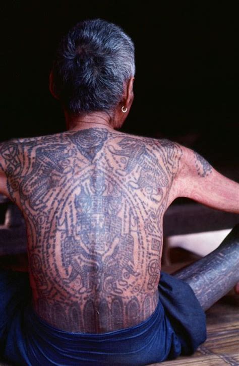 See more ideas about burma, buddhist texts, myanmar art. the vanishing tribes of burma | Thailand tattoo, Tattoos ...