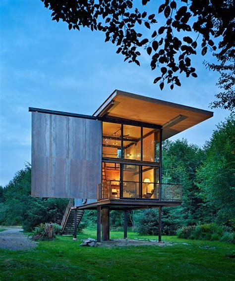 Learn more about staying here. Steel Cabin Design in the Woods