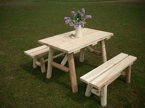 In the kitchen, players have their own water supply, a fire to cook their food. Unfinished White Cedar Log Traditional Picnic Table with ...