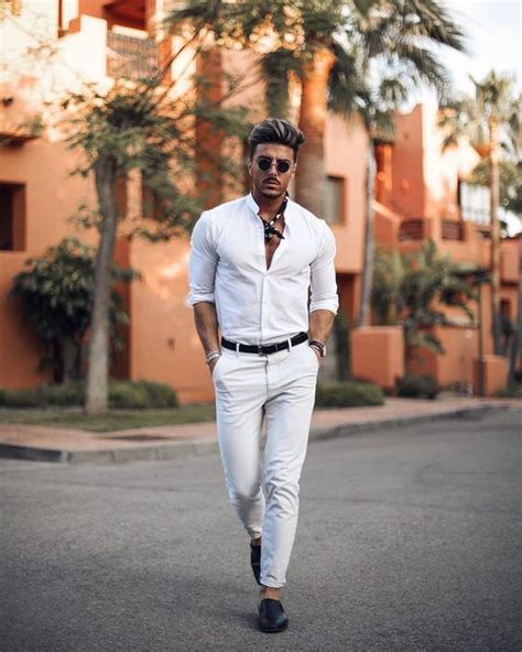 Washing brighter colours together helps to maintain the fresh whiteness of your summer tees. Picture Of a dashing outfit with neutral pants and a white ...