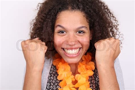 Exciting or tending to excite. Very excited lady looking at camera | Stock Photo | Colourbox