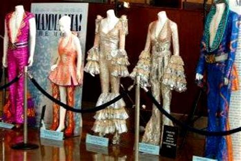 The dancers are two men and two women all wearing a white glove: Dumb and Dumber Costume,Blue Tuxedo,Orange Tuxedo,Abba ...