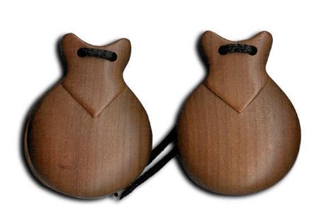 They are held in the hand and used to produce clicks fo. Doon Wooden Castanet - Long & McQuade Musical Instruments