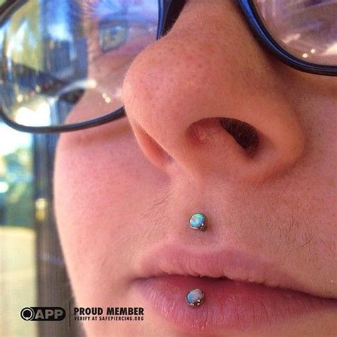 Maybe you would like to learn more about one of these? Philtrum and inverse vertical labret pierced at Sacred ...