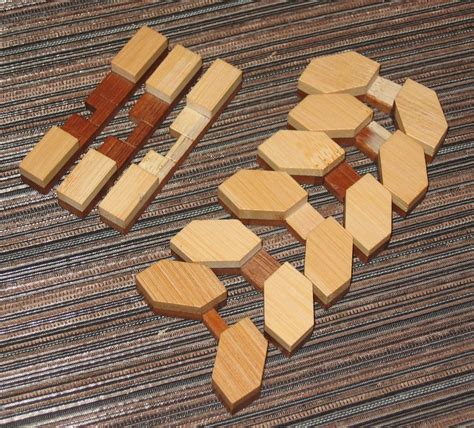 These 9 piece wooden puzzle help your kids have a fun time and learn new things too. Brian's Damn Puzzle Blog: Snowflake and Tri-Frame