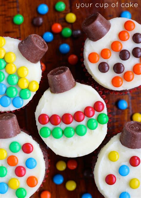 Decorate these easy vanilla cupcakes with buttercream and the topping of your choice. Easy Cupcake Decorating for Christmas - Your Cup of Cake