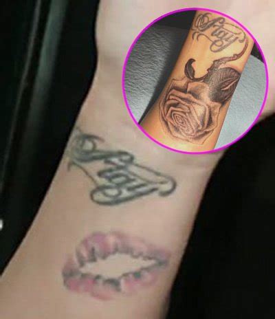 A cross on her hand. Demi Lovato Rose Tattoo Finger - Demi Lovato Songs Age