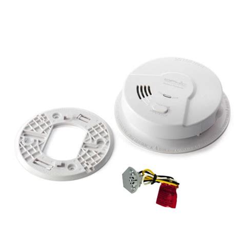 Press the test button to make sure using your finger nail or a flat head screwdriver pop up the battery cover. USI MDS107CN USST (IoPhic) Hardwired Smoke and Fire Alarm ...