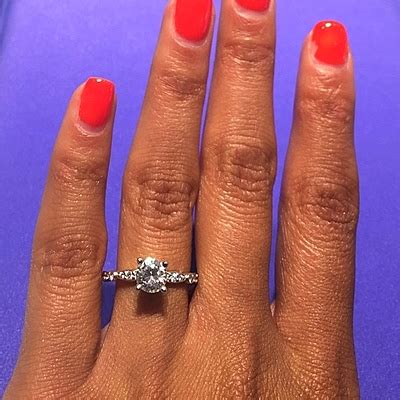 The tiny diamonds around this ring will make it sparkle from a mile away! Tacori Pave Diamond Engagement Ring 472RD