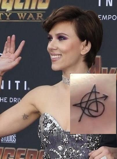 Scarlett johansson shows off new tattoos on set of 'avengers' backgrid. Scarlett Johansson's All Eight Tattoos in Body and Their ...