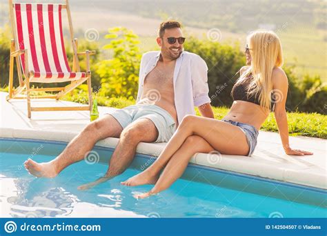 To the captain of the concrete ship. Summertime Poolside Romance Stock Image - Image of ...