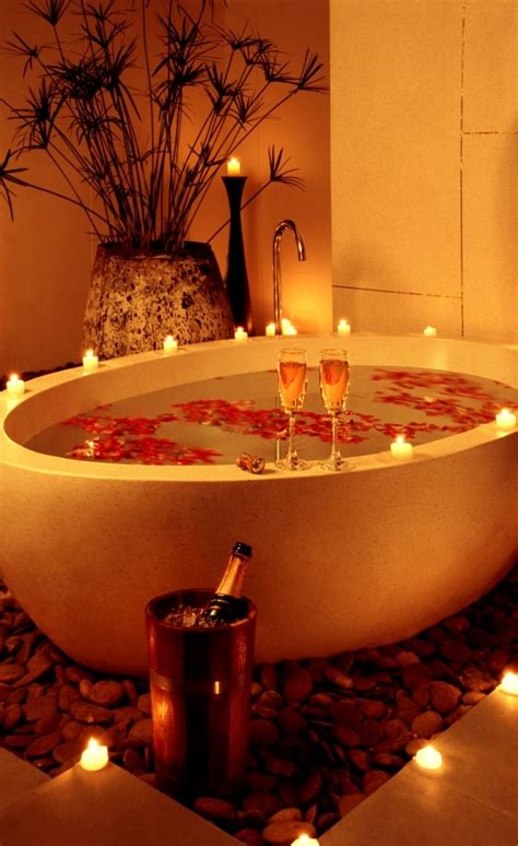 You need to arrange flower so that the flower can be like love shape. candle lit flower petals bath tub | For my home ...