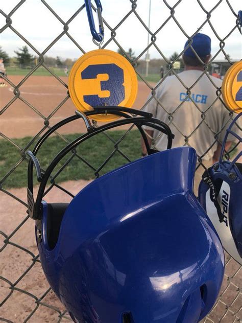 A baseball helmet or batting helmet is commonly used by baseball players during the game. Baseball/softball helmet hanger | Football helmets ...