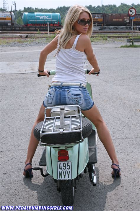 My wife and i were both riding the bus to. blonde girl cranking a scooter zündapp r50