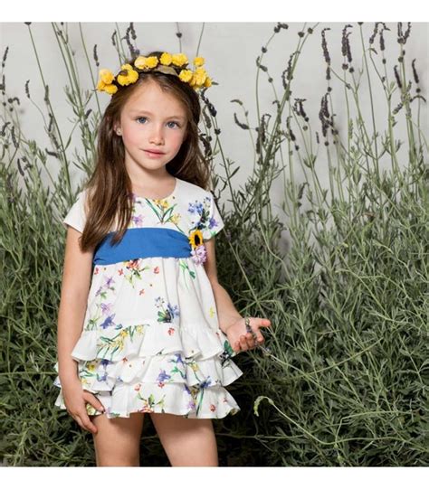 Culetín niña estampado floral con puntilla delantera y lazo trasero. ROBE BEBE FILLE "PRINTEMPS" PILAR BATANERO