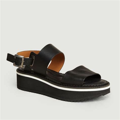 Discover the world of clergerie, an authentic french brand that creates handcrafted shoes for women with a daring, unconventional approach and a pure aesthetic, always with a touch of elegance. Sandales Compensées A Plateforme Fleur Noir Clergerie | L ...