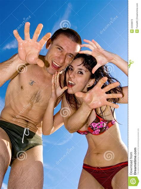 Comendo a namorada bem gostoso. The Merry Young Couple In Swimsuits Stock Image - Image of ...