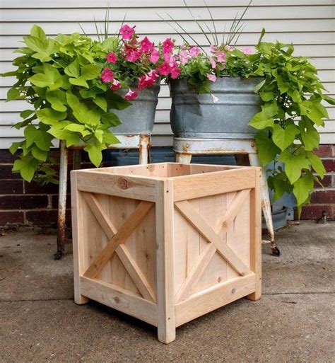 Our selection of outdoor planters and pots keep outdoor spaces looking fresh & vibrant. Farmhouse Square Cedar Planter | Cedar planters, Diy wood ...