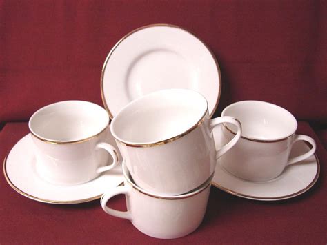 Farber inc in 1897, which manufactured gift trays and racks. Elegance By Farberware Gold 4 Cup and Saucer Set ...