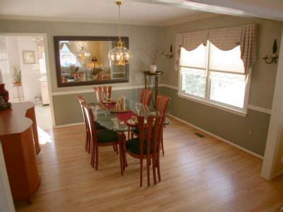 The fourth bedroom has a chair rail with wainscoting under it. Dining Room on Hardwood Floors Chair Rail And Crown ...